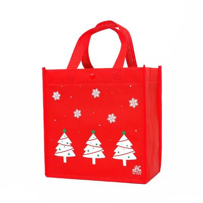 China Wholesale non woven reusable reusable pp custom factory cartoon christmas tote bag shopping bags logo printing gift bag for sale