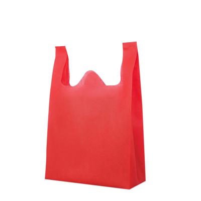 China Factory Wholesale Handled Nonwoven Vest Bags Which Can Be Printed With Logo For Reusing for sale