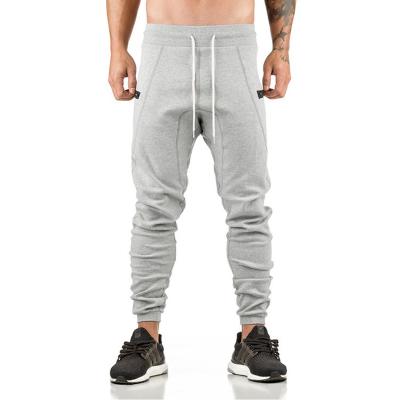 China QUICK DRY Mens Sports Running Pants Pockets Jogging Pants Legging Gym Soccer Football Training Pants Sports Elasticity Pants for sale