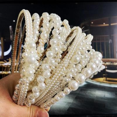 China Handmade Hair Accessories Fashion All Kinds Of Pearl Hair Band Braided Pearl Hair Band For Women for sale