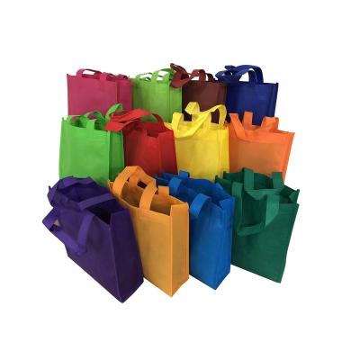 China 100% eco-friendly / lightweight / cheap promotional nonwoven tnt white pp non woven tote shopping bag non woven carry bags for sale