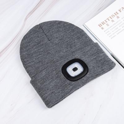 China COMMON Custom With Logo Plush Led Knitted Beanie Hat Glow In The Dark Small Rechargeable Battery Flashing Light Warm Hat for sale