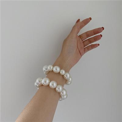 China Wedding Large Beads Hair Band Wholesale White Sweet Bracelets Bead Hair Bands For Women for sale