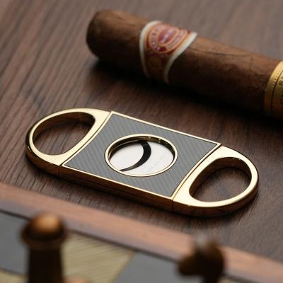 China Premium Handheld Travel Cigar Cutter Accessories Carbon Fiber Double-Blade Stainless Steel Custom Cigar Cutter for sale