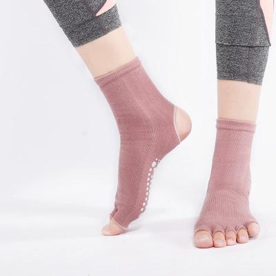 China Wholesale Breathable Women's Comfortable Toe Foot Aligner Booties Massage Yoga Gym Half Toe Socks for sale