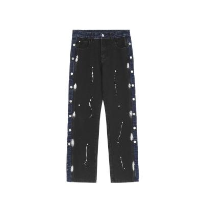 China Street casual trend Anti-wrinkle side-breasted style side-breasted ink splatter pants stitched loose straight jeans men for sale