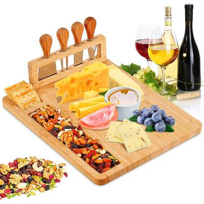 China Sustainable Bamboo Wooden Charcuterie Slide-Out 4 Drawer Magnetic Cheese Board Set With Ceramic Cutlery Bowls And Knife for sale