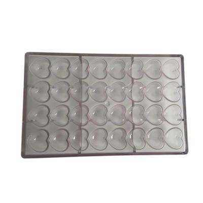 China 2021 Sustainable New PC Heart Shaped Chocolate Molds Customized Polycarbonate Plastic Molds For Chocolate for sale