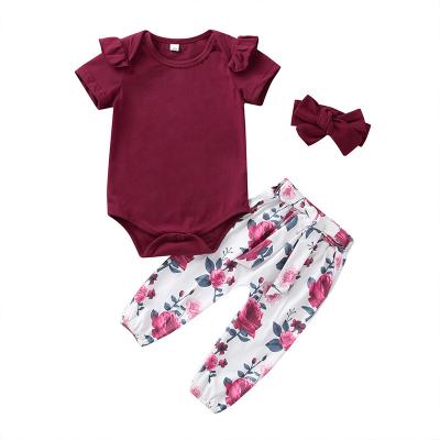 China Breathable Newborn Baby Clothes Flutter Sleeve Raglan Romper Tops Floral Pants Baby Outfit With Headband for sale