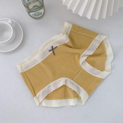 China Cheap Wholesale Antibacterial Cotton Girls Comfortable Panties Panties Lace Up Mid Waist Briefs for sale