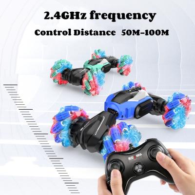 China Electric Obstacle Avoidance RC Monster Truck Toys Cars Stop Drift Off Road Double Side Twisted Toys 28cm Music Light Hand Watch Toys For Boys for sale