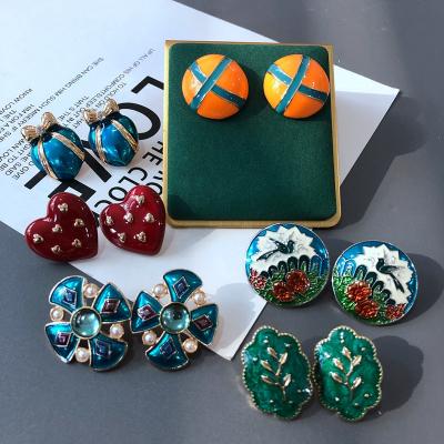 China FASHIONABLE Overseas Flower FASHIONABLE Overseas Silver Colored Enamels Orange Morden Jewelry Vintage Stud Replica 925 Needle Stud for sale