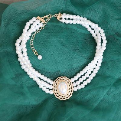 China Multilayer Temperament Short Necklace Vintage Retro Clavicle Neck Chain Western Medieval Multilayer Pearl Necklace for sale