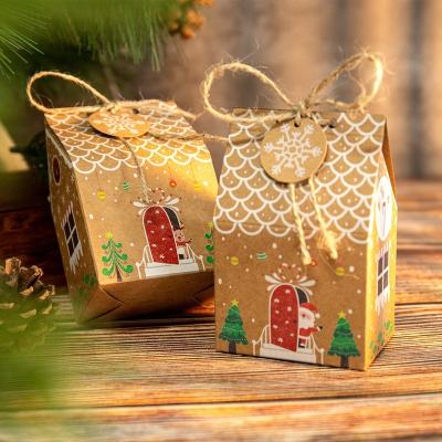 China Recyclable 24 Pcs / Set Kraft Christmas Paper Christmas Houses Form Gift Candy Cookie Packaging Box for sale