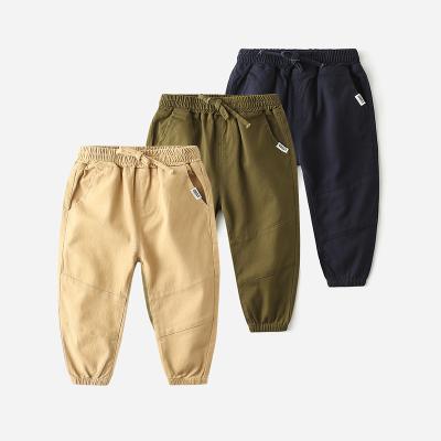 China Cargo Pants Bulk Sales Boys Knickers Cotton Harem Pockets Kids Waist Long Pants Elastic Kids Pants With Drawstring for sale