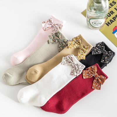 China 2021 Autumn New Fashion Solid Color Bow Children QUICK DRY Floral Socks Small for sale