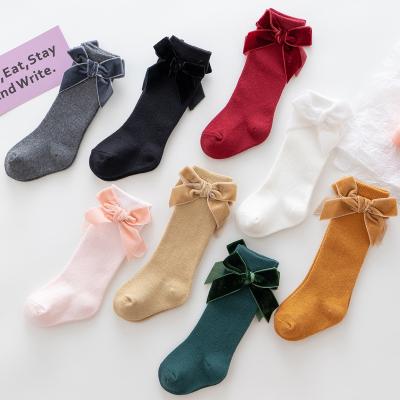 China 2021 New Style Warm Spanish Bow Velvet Big Winter Autumn Style Kids Tube Kids Long QUICK DRY SOCKS for sale