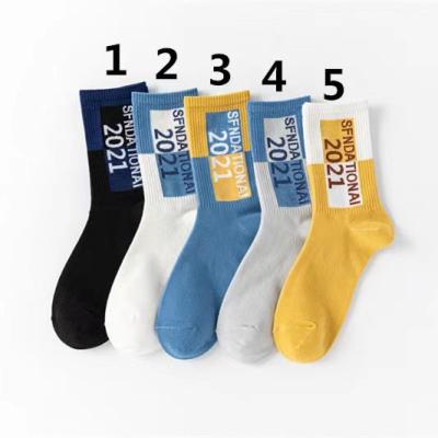 China New 2021 Korean Wholesale QUICK DRY Fashion Letter Hit Color Street Men's Knitted Socks 100 Cotton Socks For Men for sale