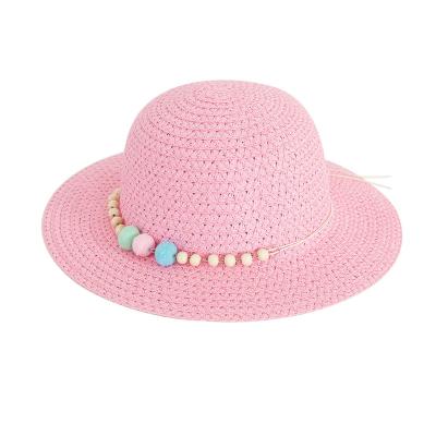 China Cheap Promotional Girls Pearl Decoration Beach Hat Eco-friendly With Plush Ball Summer Sun Shade Soft Wide Brim Kids Straw Hat for sale