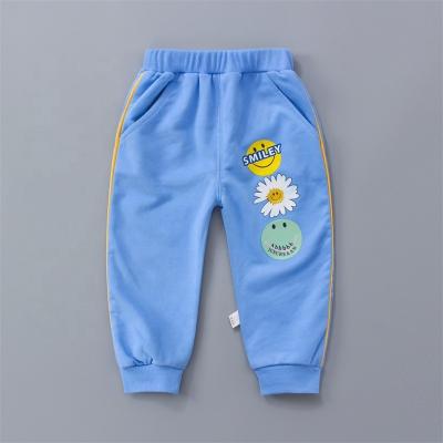 China Anti-wrinkle factory price children's pants solid color baby children sweatpants full long pants for sale