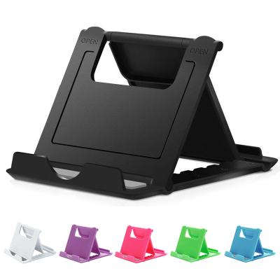 China Portable Adjustable Universal Plastic Mobile Phone Holder Foldable Mobile Phone Stand Desktop Holder With Logo Customized for sale