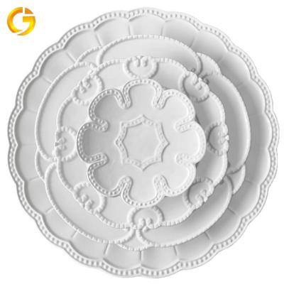 China Viable Wholesale Embossed Ceramic Dinnerware Plates Wedding Porcelain Engraving Dinner Sets for sale