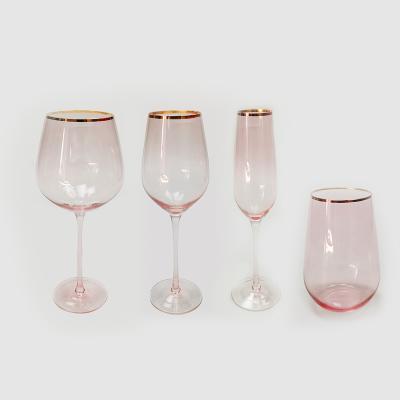 China Cheap Wholesale CLASSIC Gold Rim Gift Pink Wine Glasses Set Luxury For Bar for sale