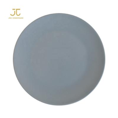 China Wholesale Viable Black Sandstone Bomb Stones Wedding Plate Porcelain Chargers 13inch for sale