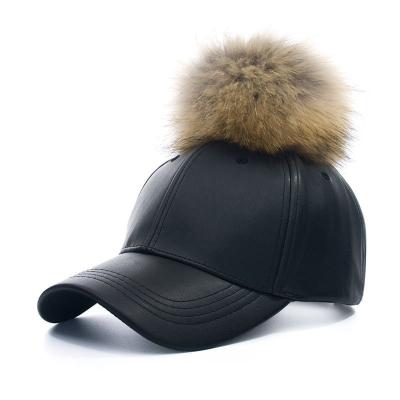 China COMMON new winter fashion raccoon fur ball hot candy color pom poms genuine leather baseball cap for sale