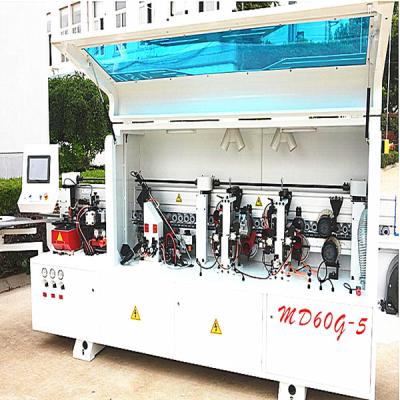 Cina Automatic woodworking good quality flake board edge banding machine for door in vendita