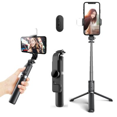 China Fold 3 in 1 Extendable Tripod for Mobile with Wireless Remote Beauty Sufficiency Light Selfie Stick Q02S for sale