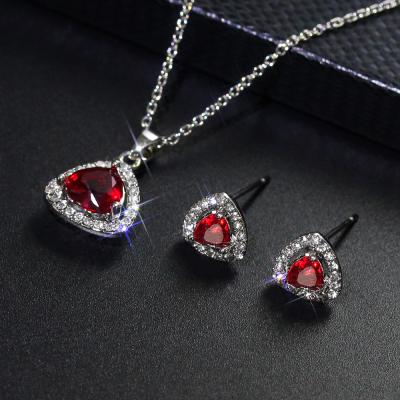 China 5A New Design 2PCS/Set European Shiny Red Cubic Zircon Necklace Earrings Diamond Crystal Ocean Heart Jewelry Triangle Set For Bride for sale