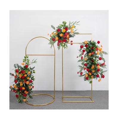 China New Durable Wedding Props Gold Metal Wedding Arches Plated Flower Stand Backdrop Christmas Decor for sale