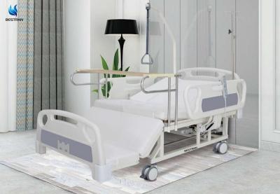 China Custom Automated Electric Home Care Bed With Dinning Table And PP Side Rail for sale