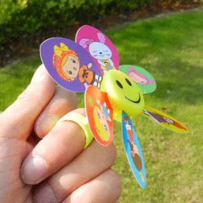 China Outdoor Toy New children's toys ring colourful windmill cartoon plastic six leaves finger windmill wholesale holiday small gifts for sale