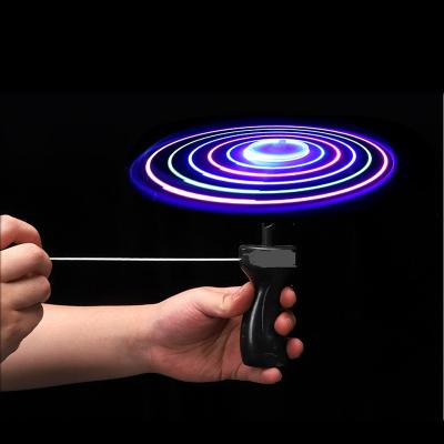 China Electronic Toy Lowest price funny plastic hand rotation push led flashing toy flying saucer outdoor toys pull line light up flying saucer toy for sale