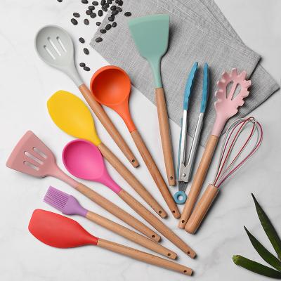 China Shovel Spoon Color Non-Stick Silicone Kitchenware Cooking Set New 11 Piece Viable Wooden Handle Silicone for sale