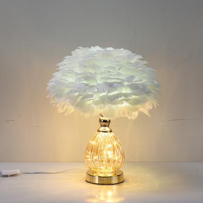 China Modern Best Selling Gold Beautiful Luxury Decorative Living Room Indoor Ceramic Desk Lamp Feather Table Low Lamp for sale