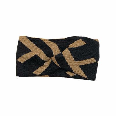 China 2022 Custom Disposable Fashion Brand Fashion Show Horns Novelty Tie Black Bulky Back Glitter Logo Disposable Headbands for sale