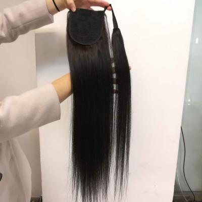 China Silky Straight Hair Ponytail Body Wave Feeling Soft Hair Clip In Pony Tail For Women Natural Drawstring Extensions Black for sale