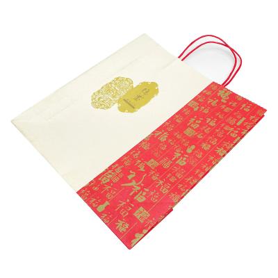 China Recyclable Customized Paper Bags Design White Paper Bags With Handles Chinese Red Paper Bag for sale