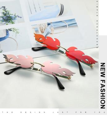 China Fashion sunglasses fire frameless street fashion personality of 400 metal UV flame sunglasses sunglasses for sale