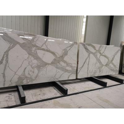 China Modern Natural White Italy Boulgauri Gold Oro Marble Slab Price Bookmatched Prezzo Marmo Calacatta for sale