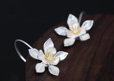 China New Creative Design S925 Silver Earrings Female Temperament Retro Literary Lotus Earrings Ancient Folk Ear Hook for sale