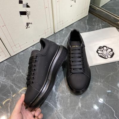 China Fashion Trend Customized Brand Classic Thick Single Sport MC Platform Trainers Women Black White Sneakers For Men for sale