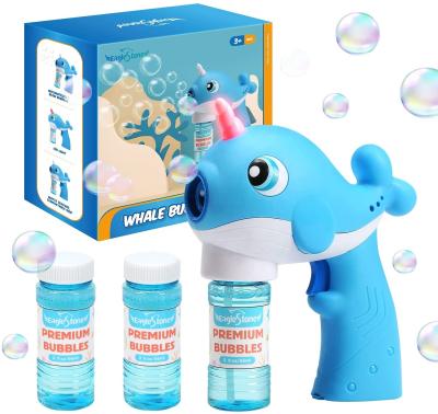 China 2021 New Lovely Blue Whale Shape Plastic Outdoor Activity Comfortable Grip Blow Automatically Bubble Bubble Gun Toy with LED Light for sale