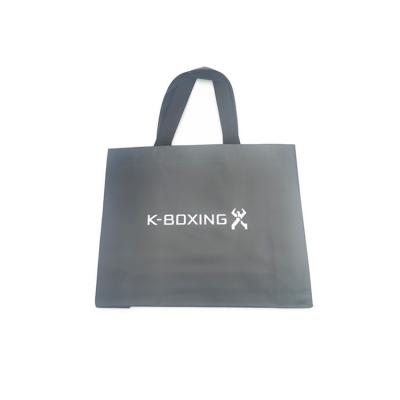 China OEM Clothing Store Black Non Woven Carry Apparel Shopping Non Woven Custom Printing Handle Bag With Logo for sale