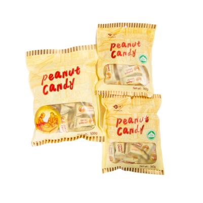 China 2021 normal hot sale rectangle taste sweet salty peanut crispy candy with yellow packing bag for sale