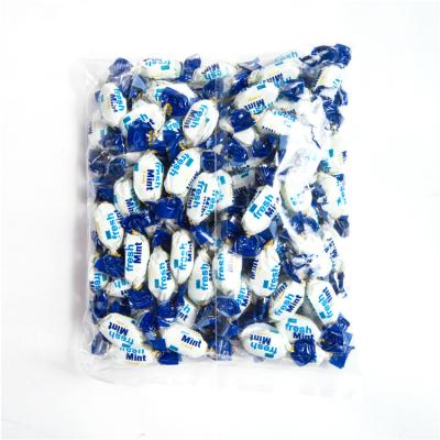 China Natural Oval Shape Soft Cool Taste Peppermint Hard Candy With Blue Packing Bag for sale