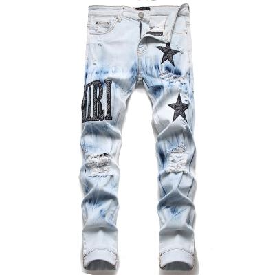 China Men's Breathable Jeans Streetwear Fashion Blue Color Paint Printed Jeans Mens Designer Hip Hop Pants Elastic Slim Fit Style Pencil Punk Pants for sale